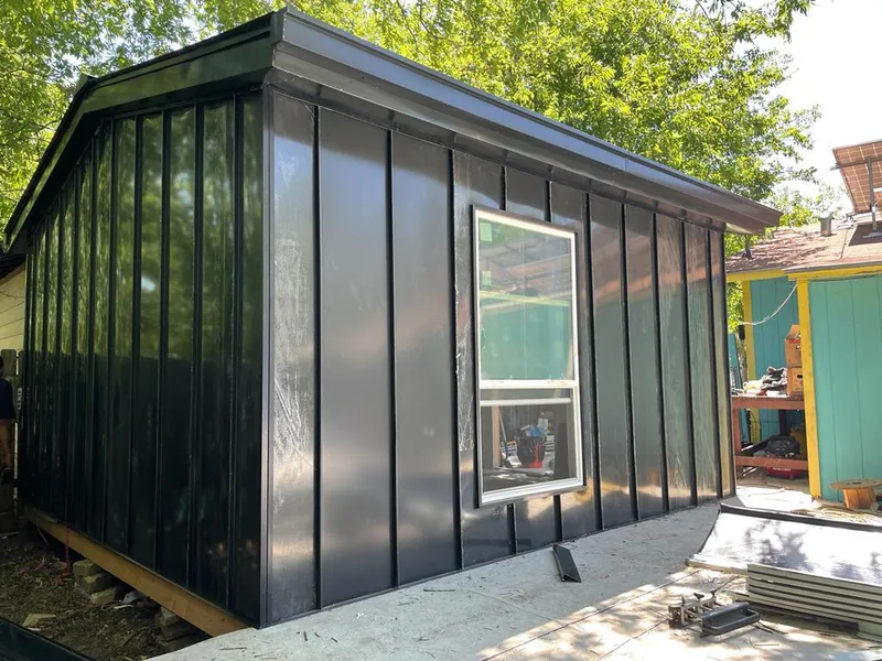 Black standing seam metal wall panels for Metal Roof Installation in Onondaga