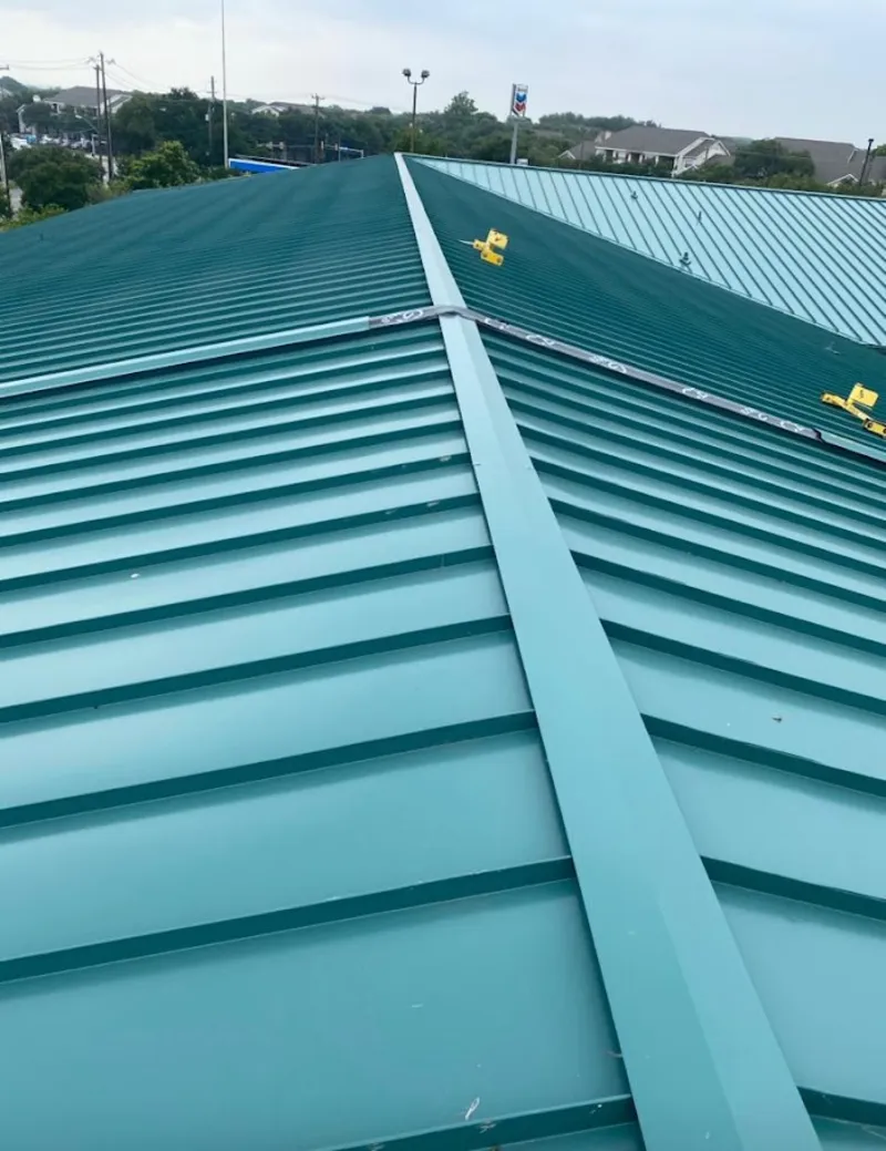 Green commercial metal roof ridge and valley for Metal Roof Repair in Onondaga
